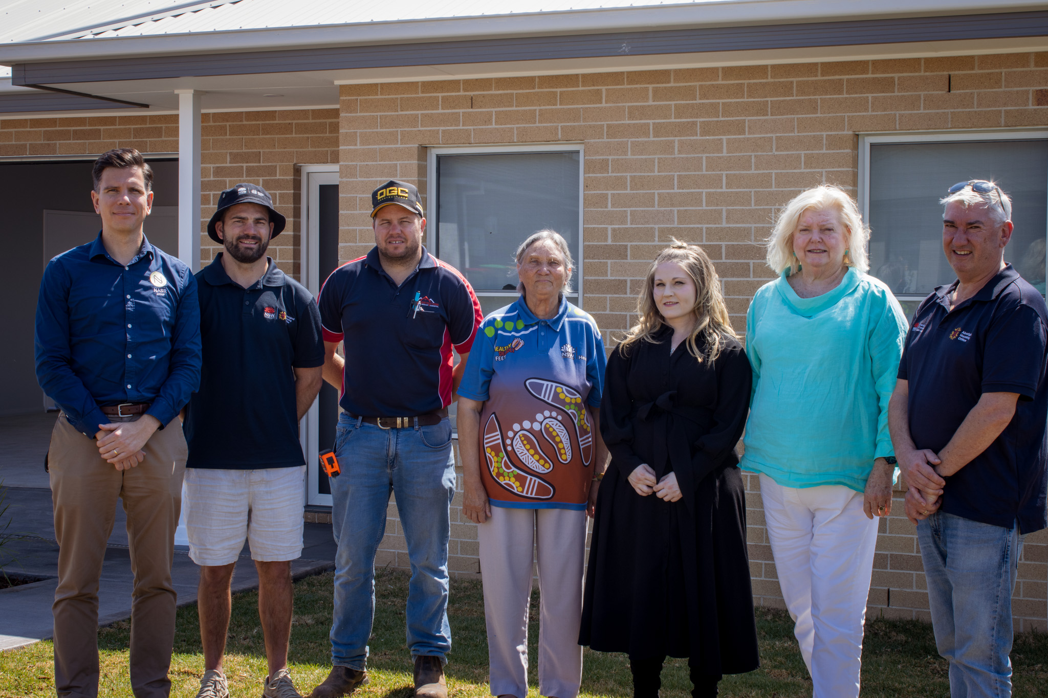 7 people attending the handover of the home in Dubbo